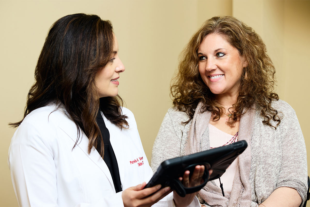 a woman gets a consultation for blepharoplasty or eyelid lift in Arlington, Germantown, and Olive Branch